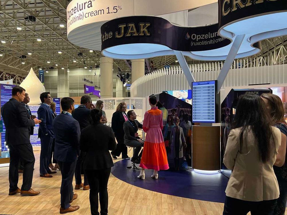 CracktheJack trade show booth with arcade game and leaderboard built by Houdini Interactive