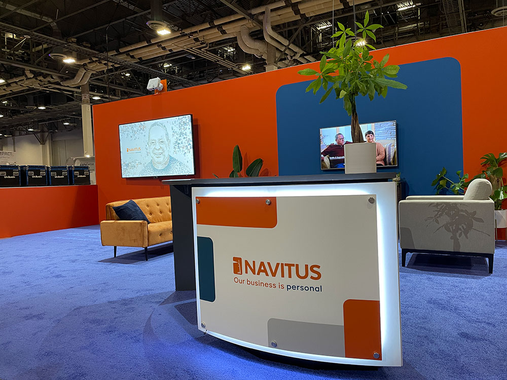 Navitus Navitus booth at the HLTH convention in 2022 with body tracking installation by Houdini Interactive